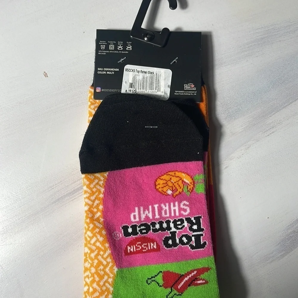 4 pairs of men socks. Football. Top Ramen. Beer. Lemur size 6-12